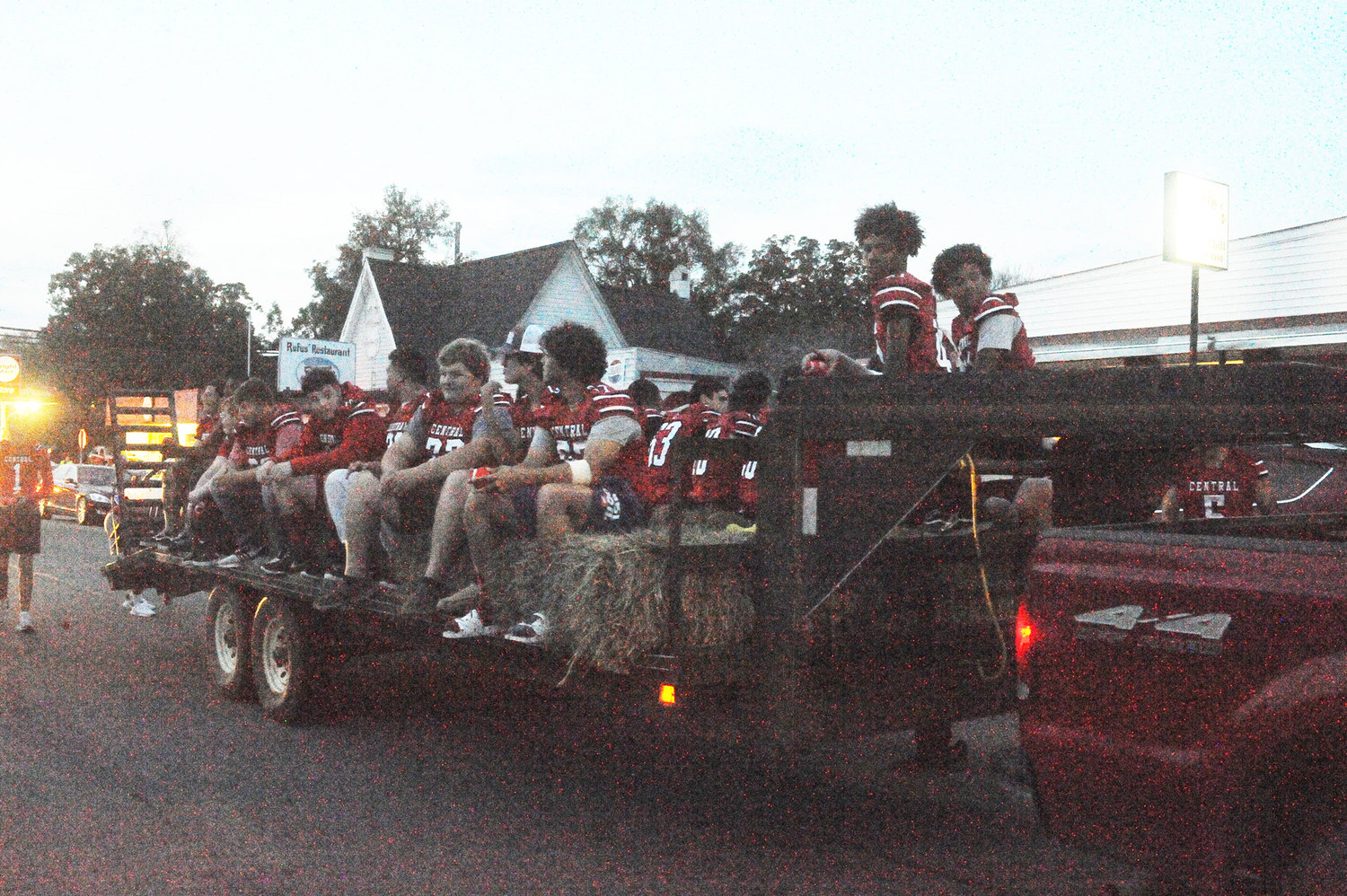 Chatham Central’s football team takes a hayride along the parade route for the 2019 Homecoming Parade in Goldston last Monday night.